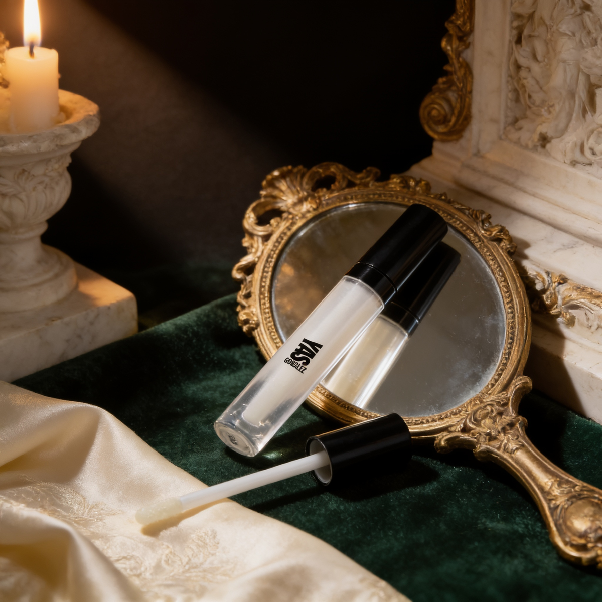 Lip Plumper beside a gilded hand mirror on green velvet