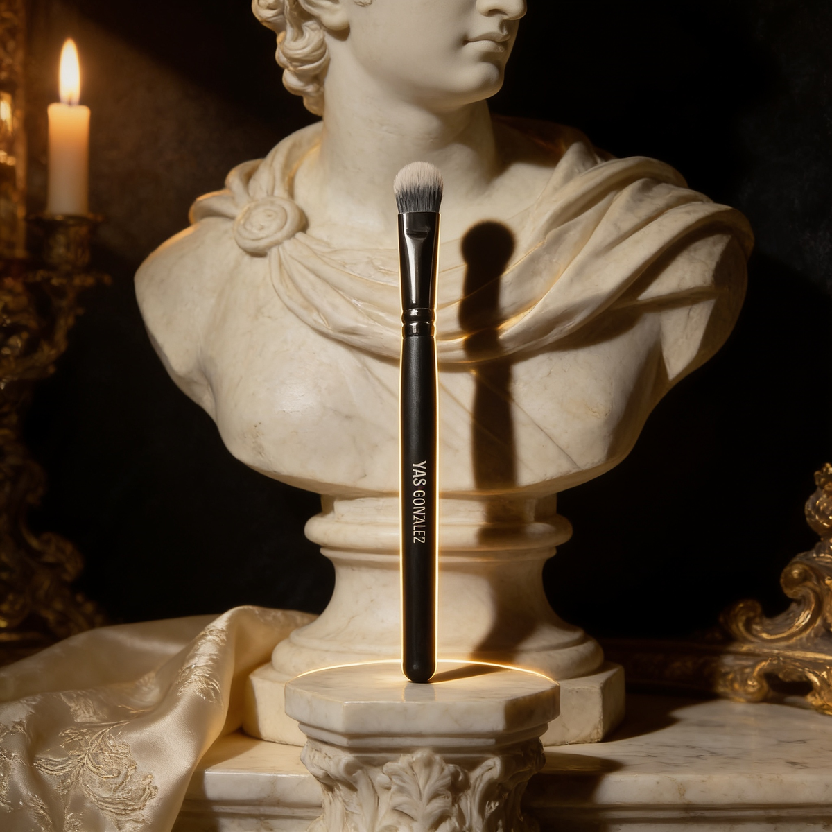 Packing Eye Brush on an ivory marble plinth in Baroque candlelight
