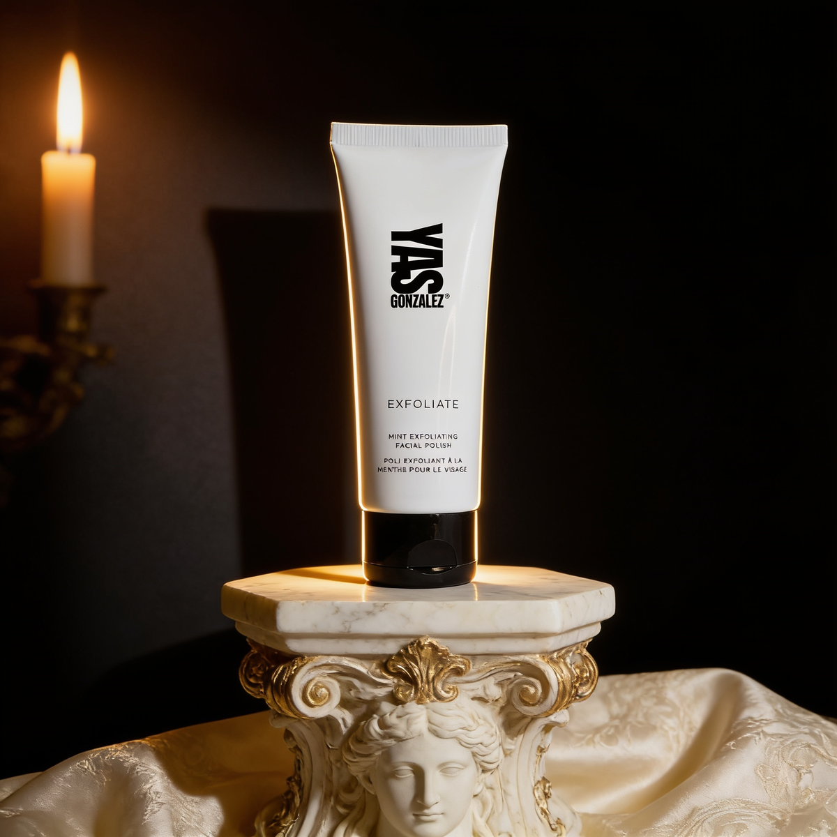 Mint Exfoliating Facial Polish on an ivory marble plinth in Baroque candlelight