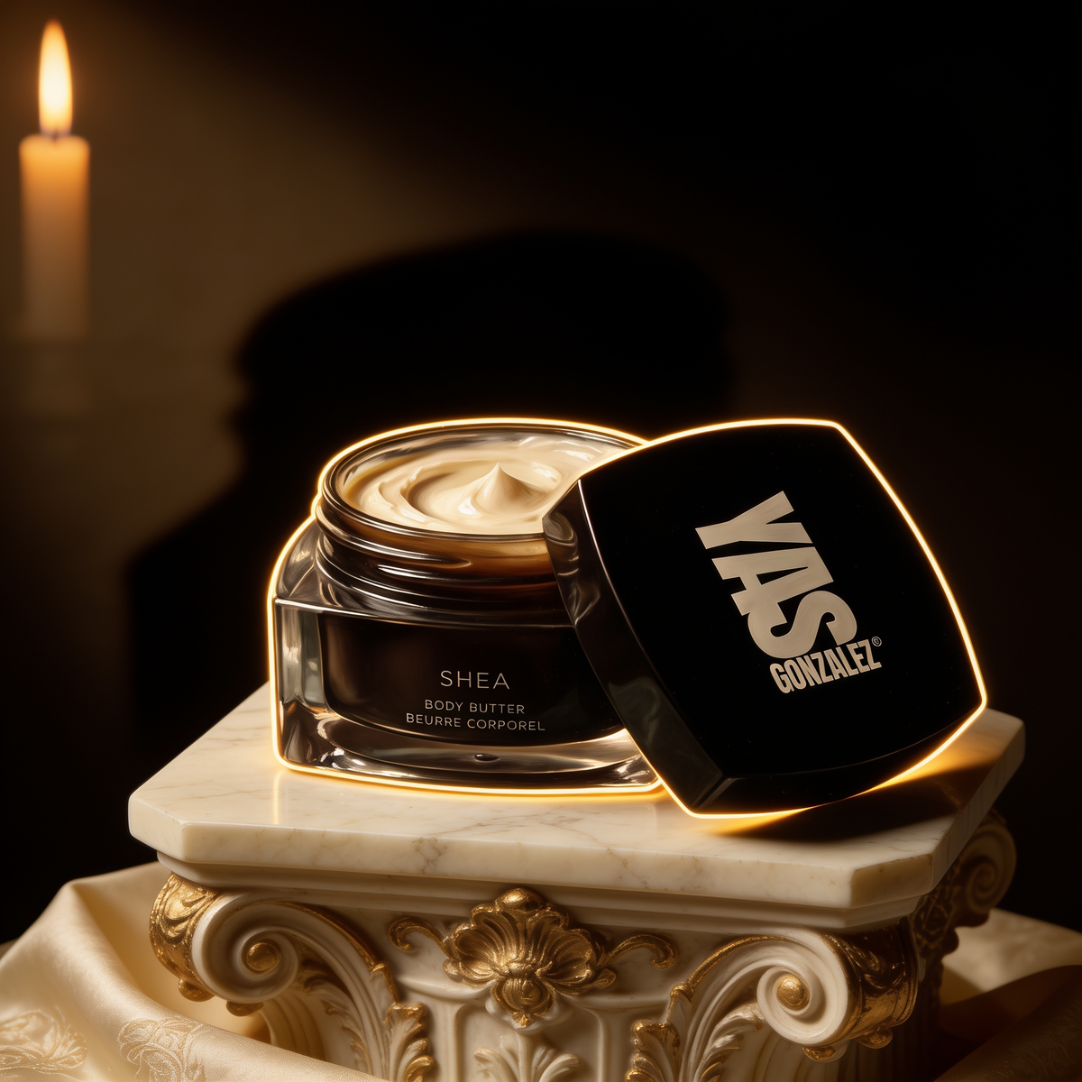 Shea Body Butter on an ivory marble plinth in Baroque candlelight